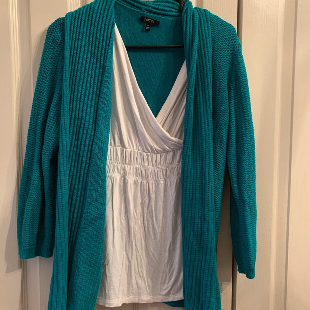Layered look teal sweater with white blouse